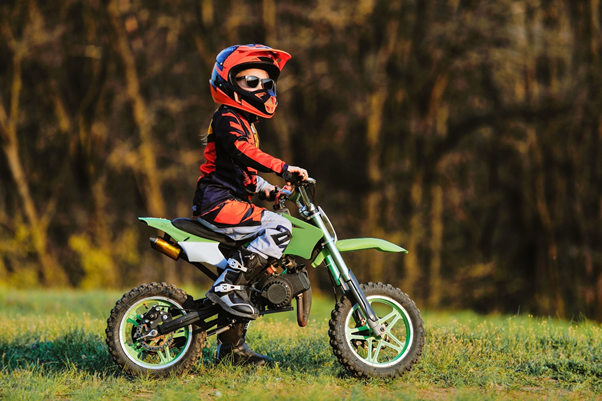 Child on an electric motor bike